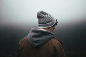 Young man thinking about HIS feelings now that he found out his girlfriend is pregnant