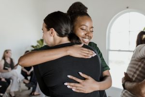 Women hugging in a maternity home