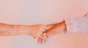 friends holding hands